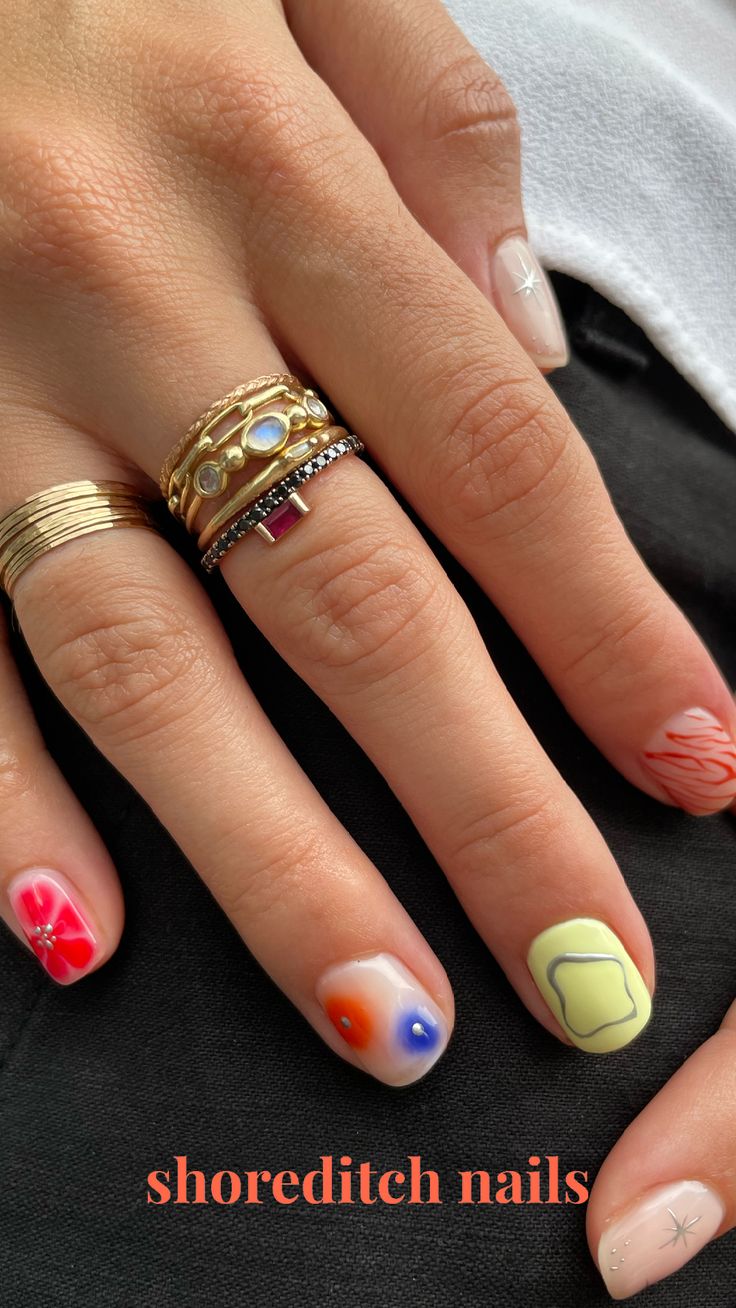 Vibrant Gradient Nail Designs: A Colorful Blend of Creativity and Elegance.