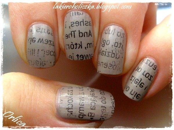 Modern Textured Nail Design: Matte Gray Base with Unique Printed Text Patterns