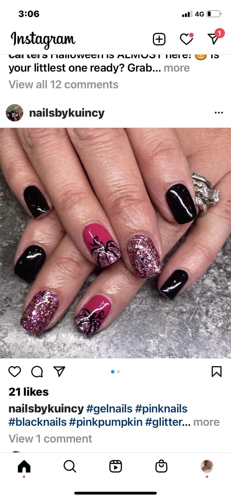 Chic Halloween Nail Design: Bold Black, Vibrant Pink, Glitter, and Whimsical Pumpkin Art.