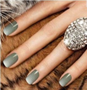 Sophisticated Matte Neutral Green Nail Design with Elegant Accents.