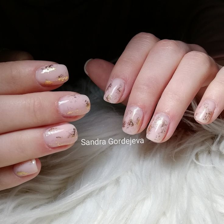 Elegant Nude Nail Design with Subtle Gold Foil Accents for Sophisticated Occasions.