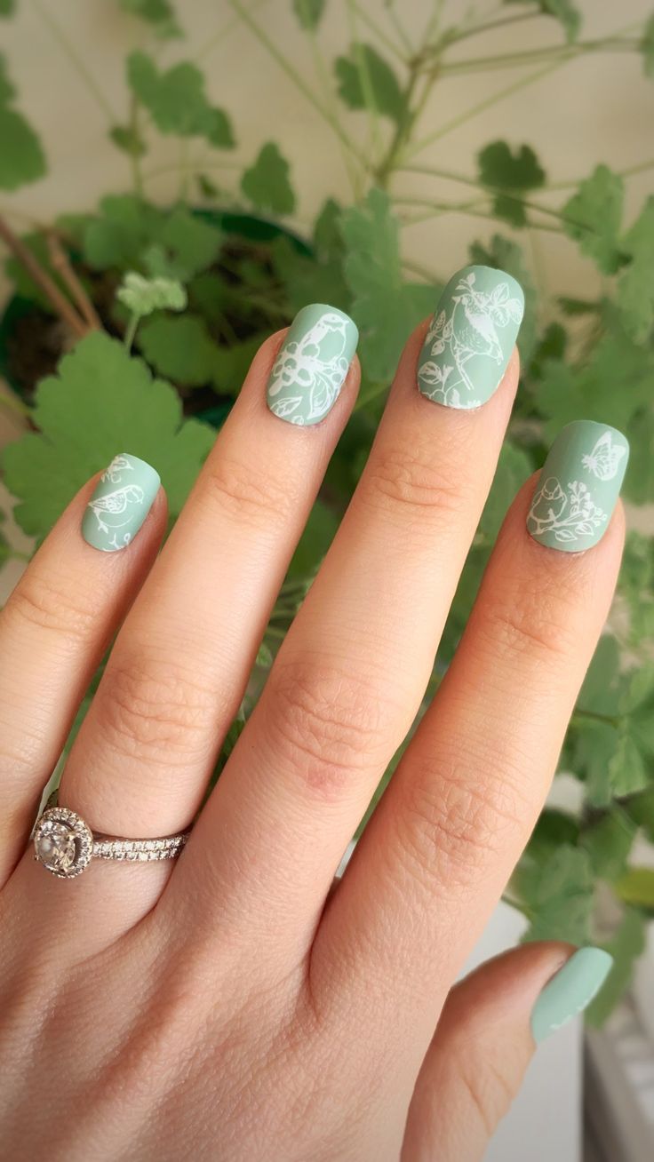 Elegant Mint Green Floral Nails for a Nature-Inspired Aesthetic.