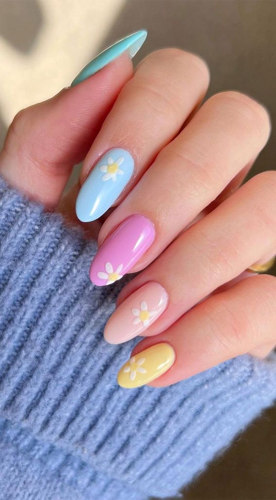 Spring-Inspired Colorful Nail Art with Pastel Shades and Floral Accents