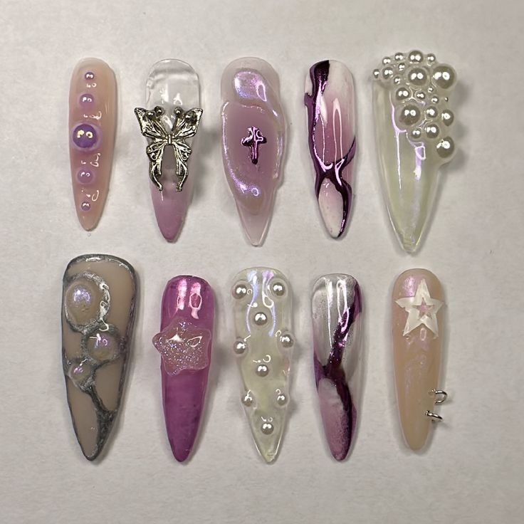 Elegant Nail Design Collection: Whimsical Patterns in Soft Pinks and Whites with Iridescent Accents.