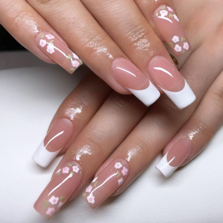 Chic Floral Nail Design with Nude Base and Classic French Tips