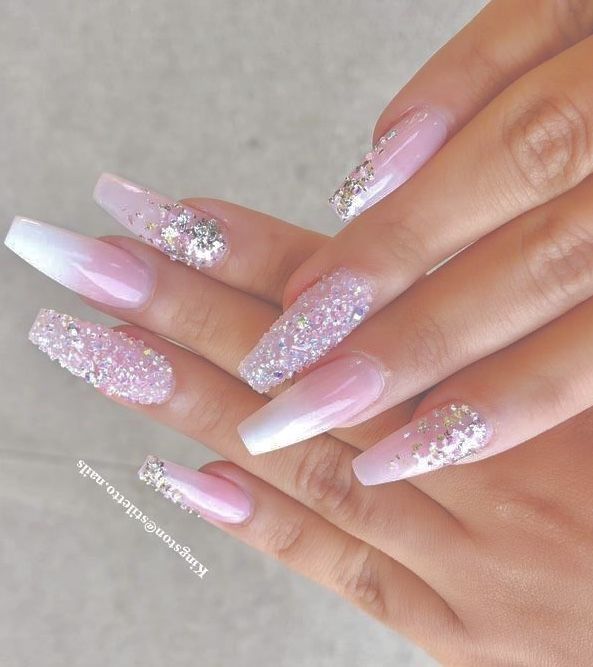 Elegant Soft Pink and Glitter Gradient Nail Design for Glamorous Occasions.