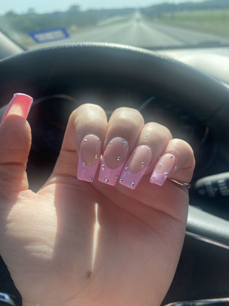 Elegant Gradient Pink French Tip Nails with Sparkling Rhinestones.