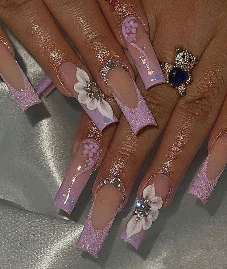 Elegant Floral-Inspired Acrylic Nails with Pink and Lavender Hues