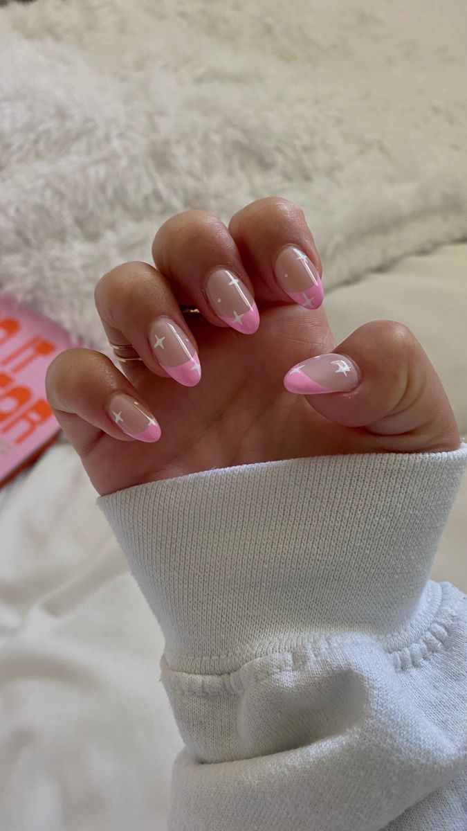 Chic and Playful Modern French Manicure with Transparent Base, Pink Tips, and White Accents.