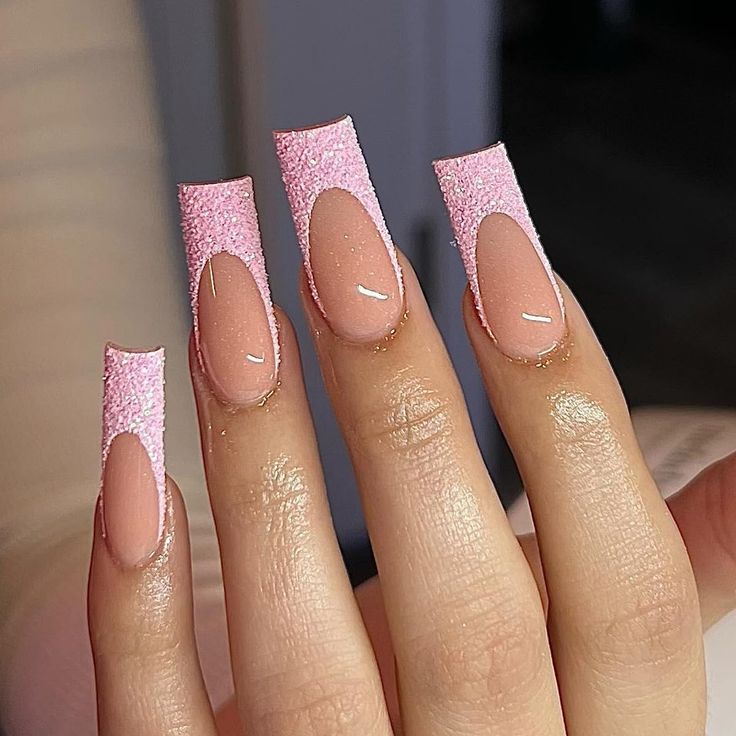 Elegant Glittery Pink Elongated Nail Design with Stylish Nude Contrast