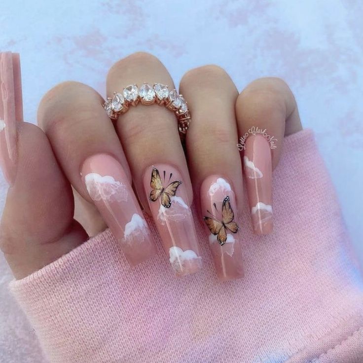 Dreamy Whimsical Nail Design with Pink Clouds and Butterflies for a Playful Spring Look