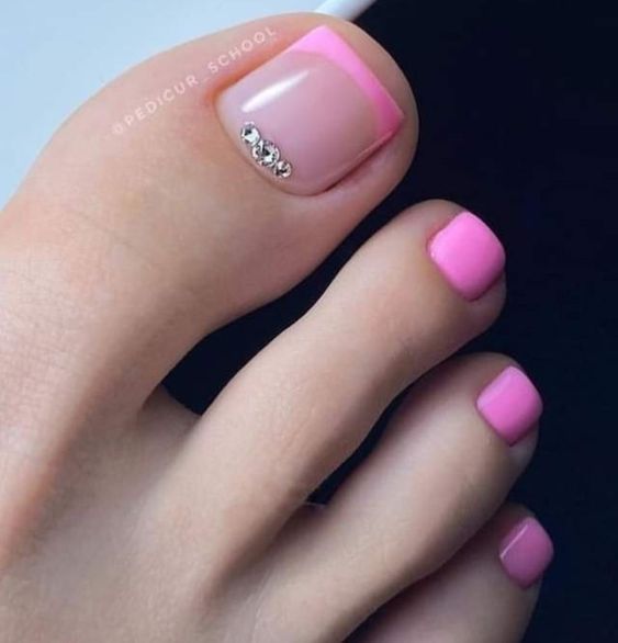 Sophisticated Soft Pink Pedicure with Contrasting Big Toe and Glamorous Rhinestones