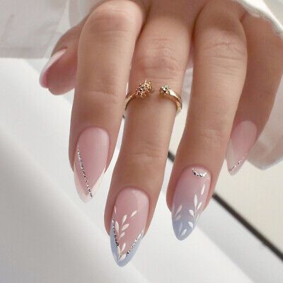 Elegant Almond-Shaped Nails with Soft Pink to Light Blue Gradient and Floral Accents.