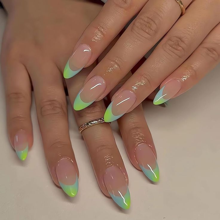 Chic Almond-Shaped Nails with Gradient Green Tips for a Fresh Modern Look.