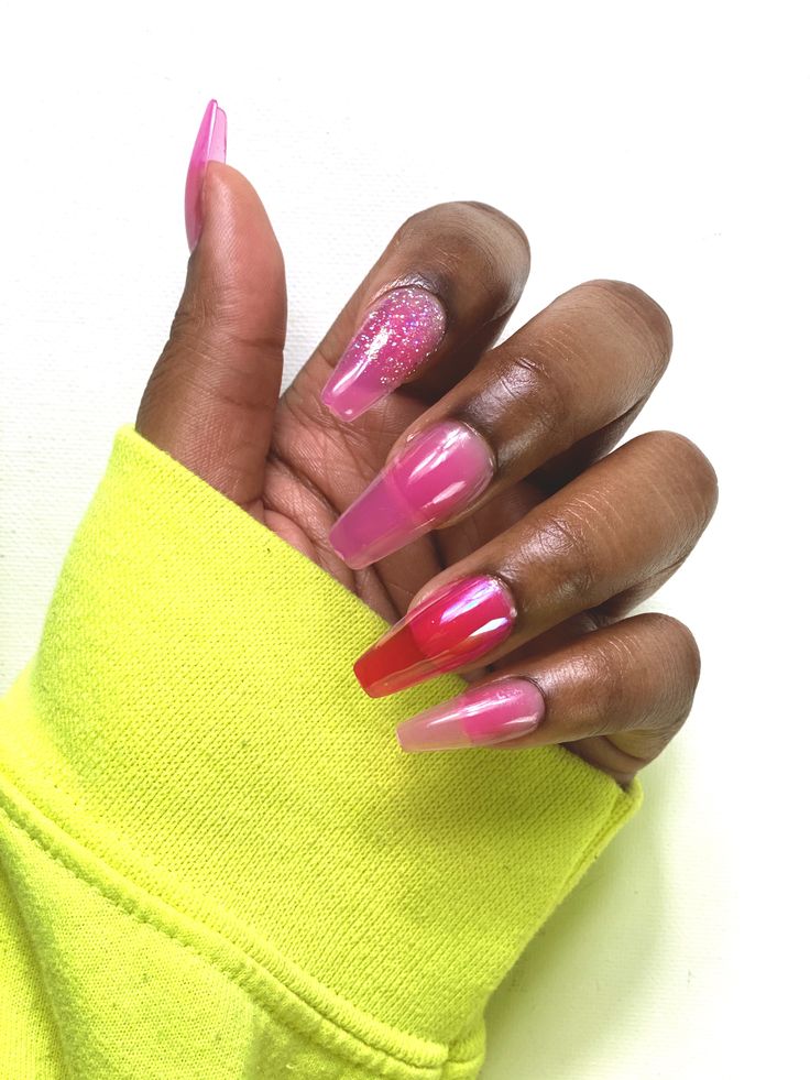 Playful Chic: Gradient Pink Nail Design with Glitter and Bold Red Accent