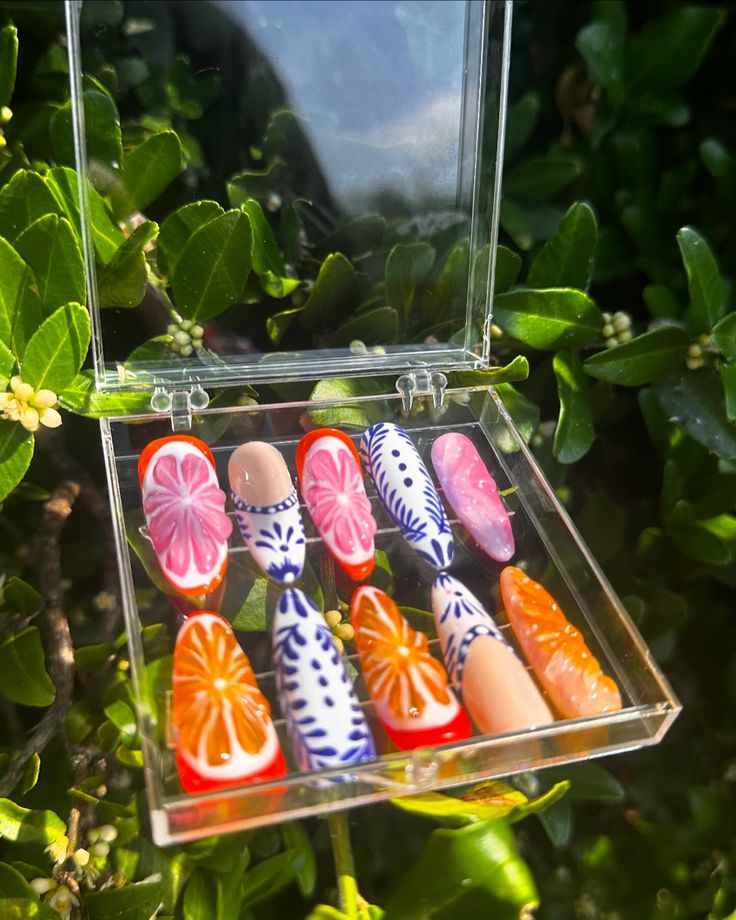 Vibrant Floral and Citrus Nail Designs for a Cheerful Summer Manicure