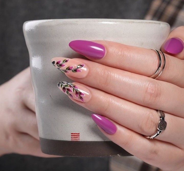 Versatile Colorful Nail Art Design with Glossy Purple, Geometric Shapes, and Intricate Patterns.