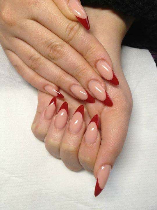 Sophisticated French Tip Nail Design in Nude and Bold Red for Any Occasion