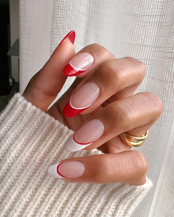 Sophisticated Red-Accented French Tip Nail Design for a Bold Statement.