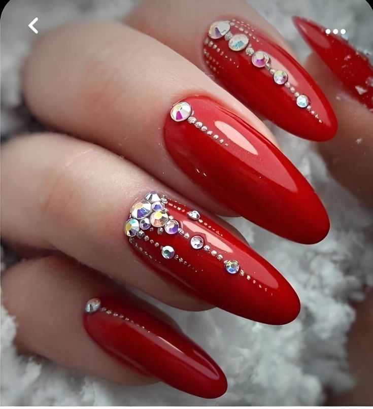 Glamorous Red Rhinestone Nails for a Modern Sophisticated Look.