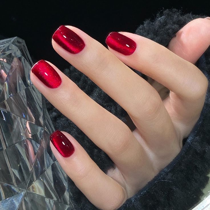 Elegant Glossy Red Gradient Nails for a Chic Festive Look.