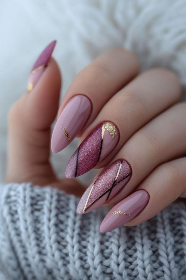 Chic Nail Art: Soft Pink and Glitter with Modern Geometric Gold Accents.