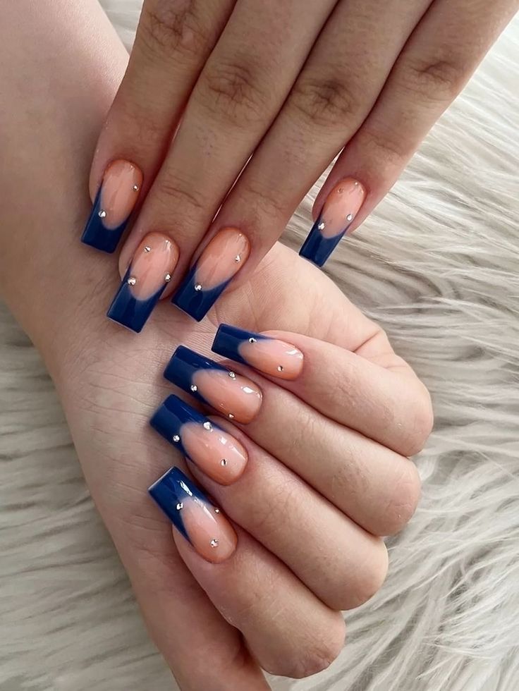 Elegant Blue Ombre Nail Design with Rhinestones and Sophisticated Shape