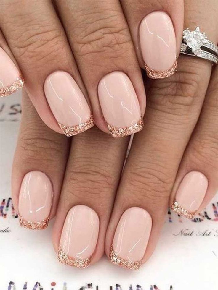 Chic Nude Base with Sparkling Rose Gold Tips: A Sophisticated Nail Design for Any Occasion.