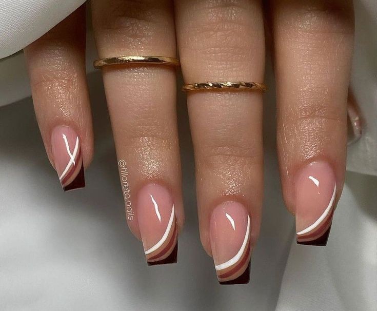 Chic and Sophisticated Nude and Deep Burgundy Nail Design with Geometric White Accents