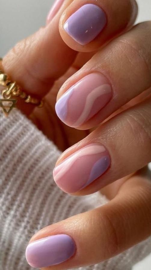 Elegant Pastel Nail Design with Artistic Wavy Lines