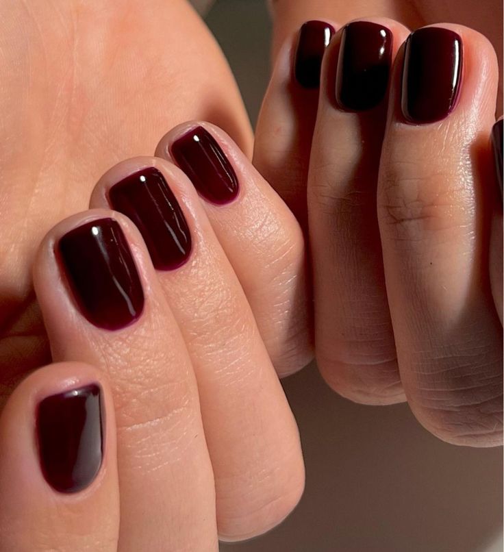 Elegant Glossy Deep Burgundy Nail Design with Chic Square Tips.