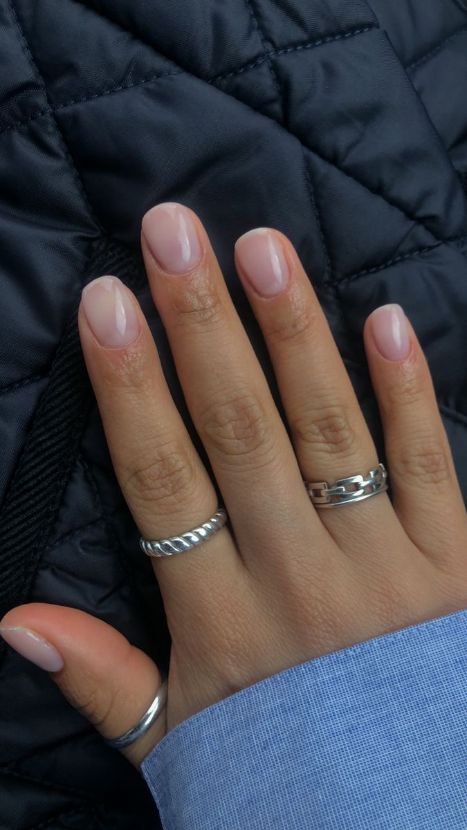 Elegant Nude Manicure: A Polished Look with Natural Shine and Minimalist Aesthetic.