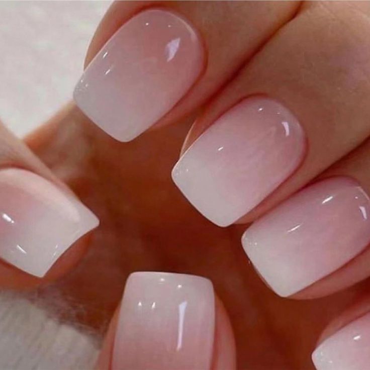 Elegant Ombre Nail Design with Soft Pink Gradient and High Shine Finish.