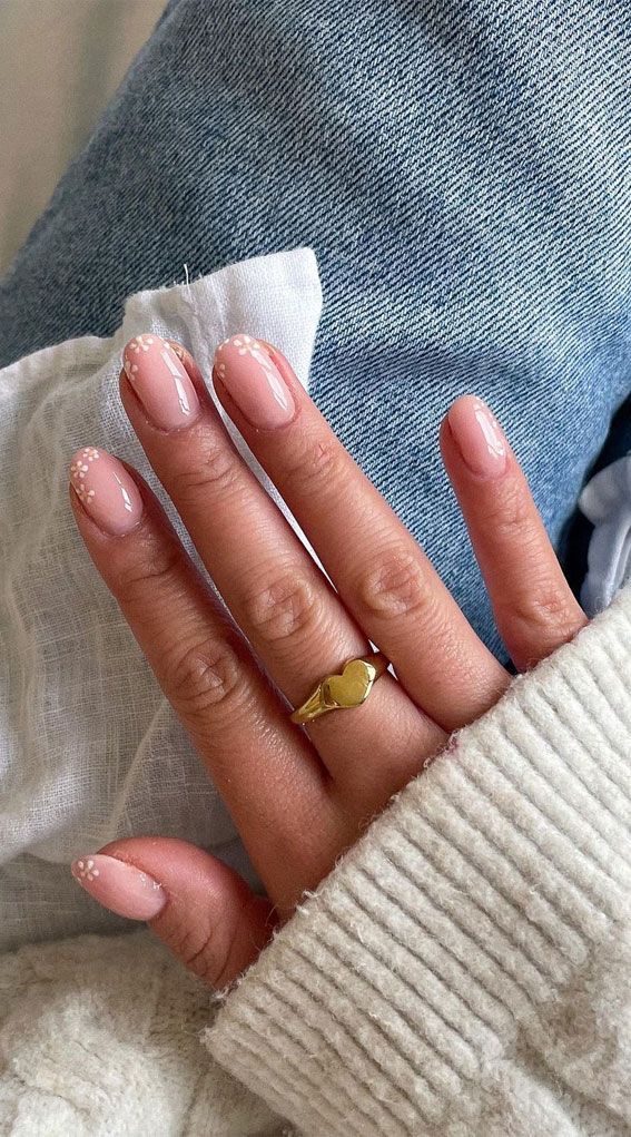 Chic Elegant Nude Nail Design with Delicate White Dots and Stylish Golden Ring