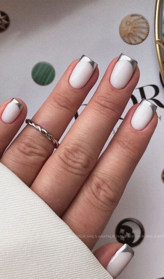 Sleek Metallic Silver Tip French Manicure with Minimalist Elegance.