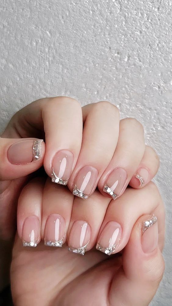 Chic Nude Nail Design with Geometric Silver Tips for Any Occasion