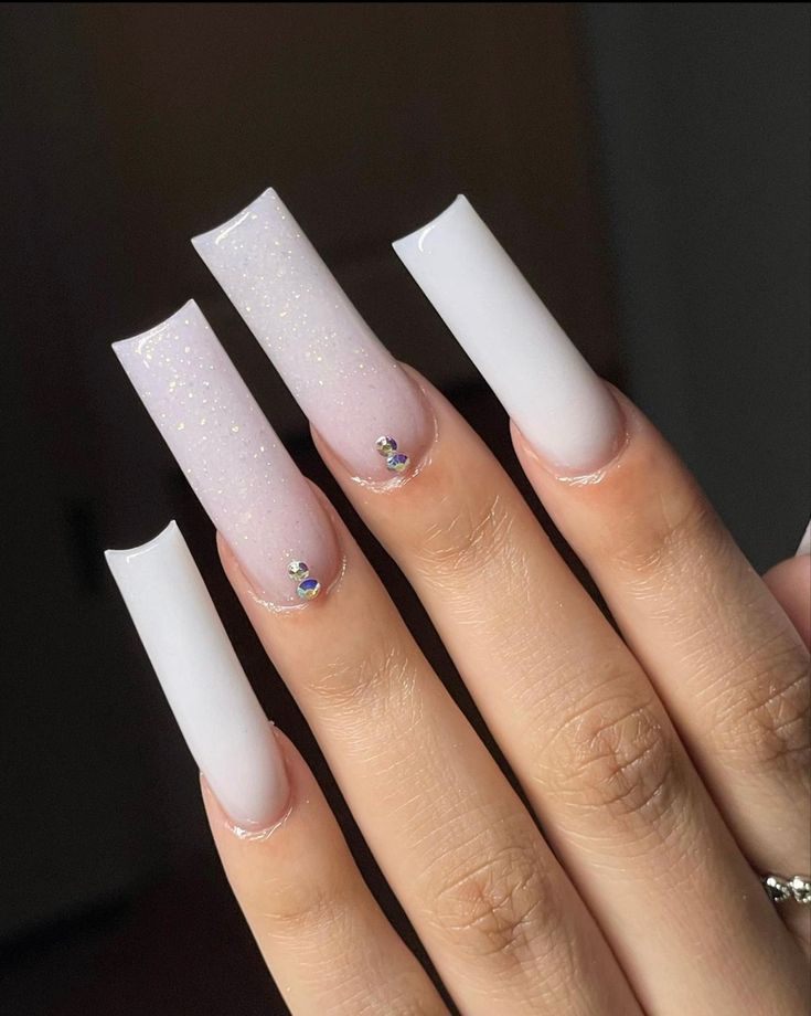 Elegant Ombre Long Nails with Glitter and Gem Accents for a Chic Look