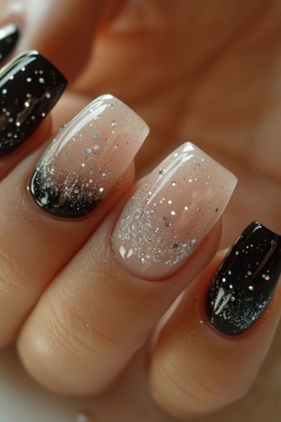 Elegant Ombre Nail Design with Nude-Black Gradient and Glitter Accents