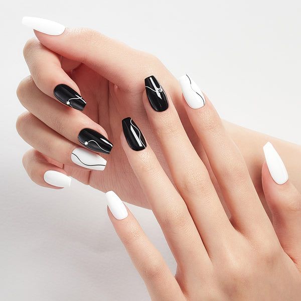 Chic Black and White Nail Design: A Striking Modern Contrast with Glossy and Matte Finishes.