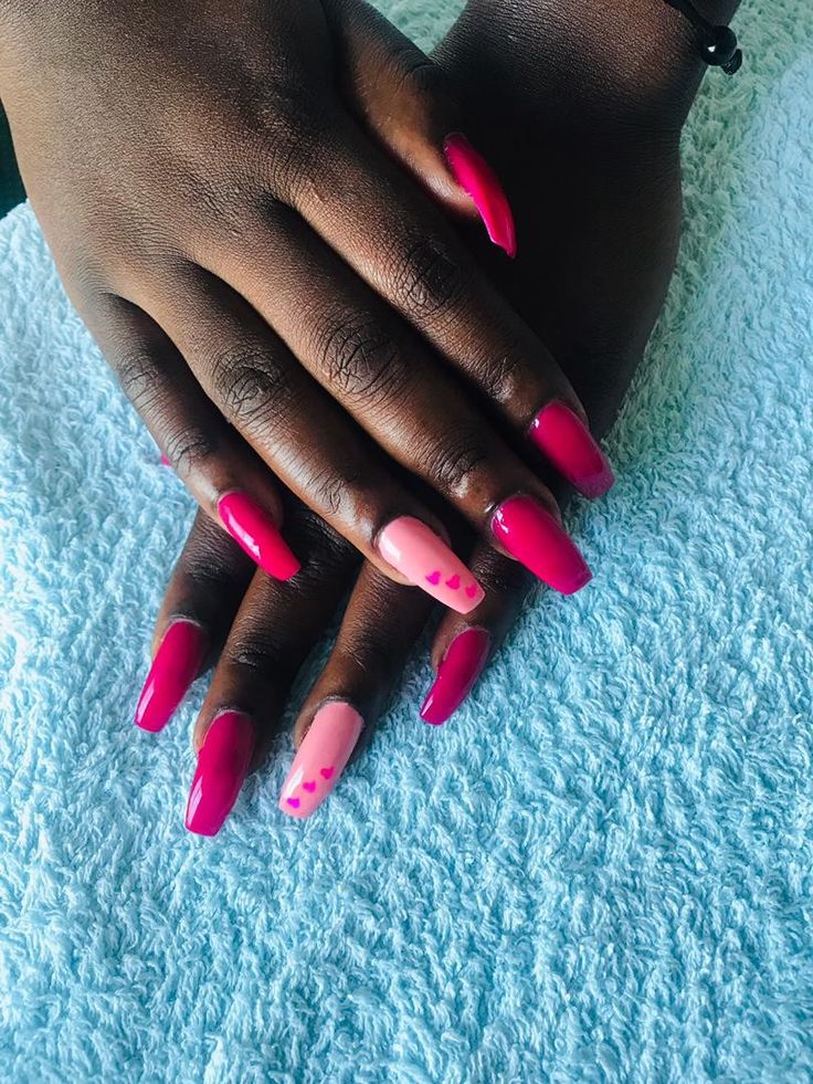 Vibrant Pink Nail Design: Playful Hearts and Sharp Edges for a Fun Feminine Aesthetic