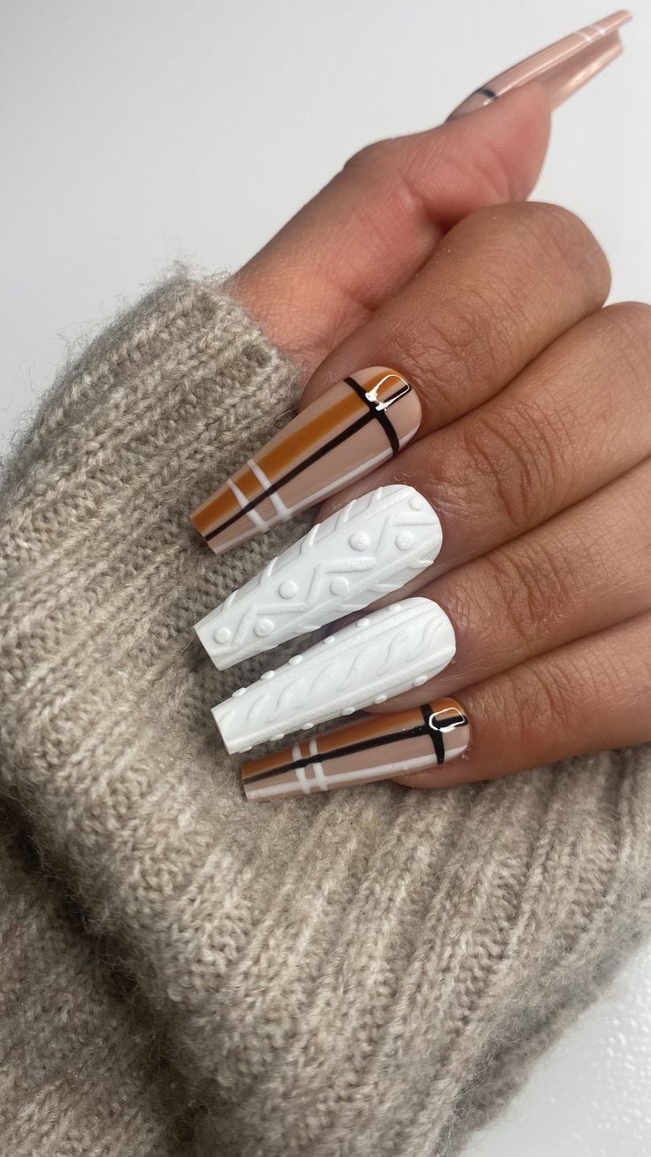 Chic Multi-Textured Nail Design with Glossy Browns, Whites, and Metallic Accents.