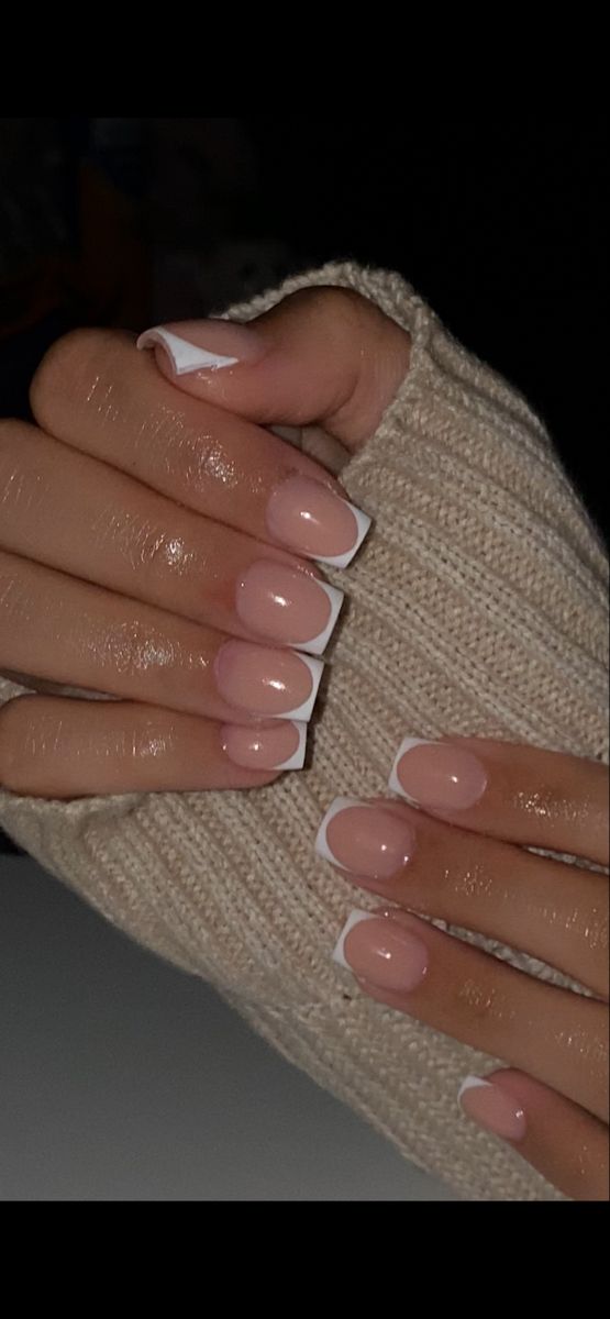 Timeless Elegance: Classic French Manicure with Soft Nude Polish and Pristine White Tips