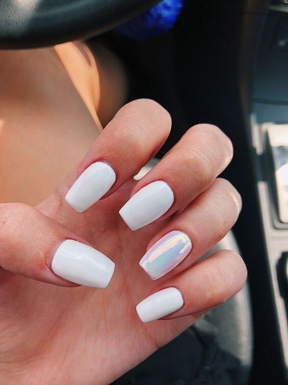 Elegant Chic White Nail Design with Pearlescent Accent for a Modern Look.