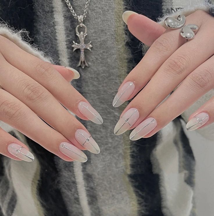 Chic Almond-Shaped Nails with Soft Ombre and Minimal Silver Accents