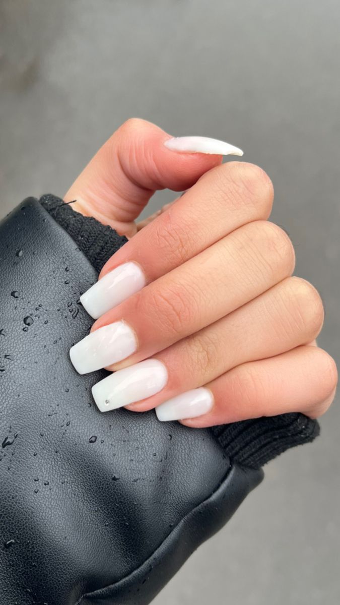 Chic Square Nails: Glossy White Elegance for Any Occasion.