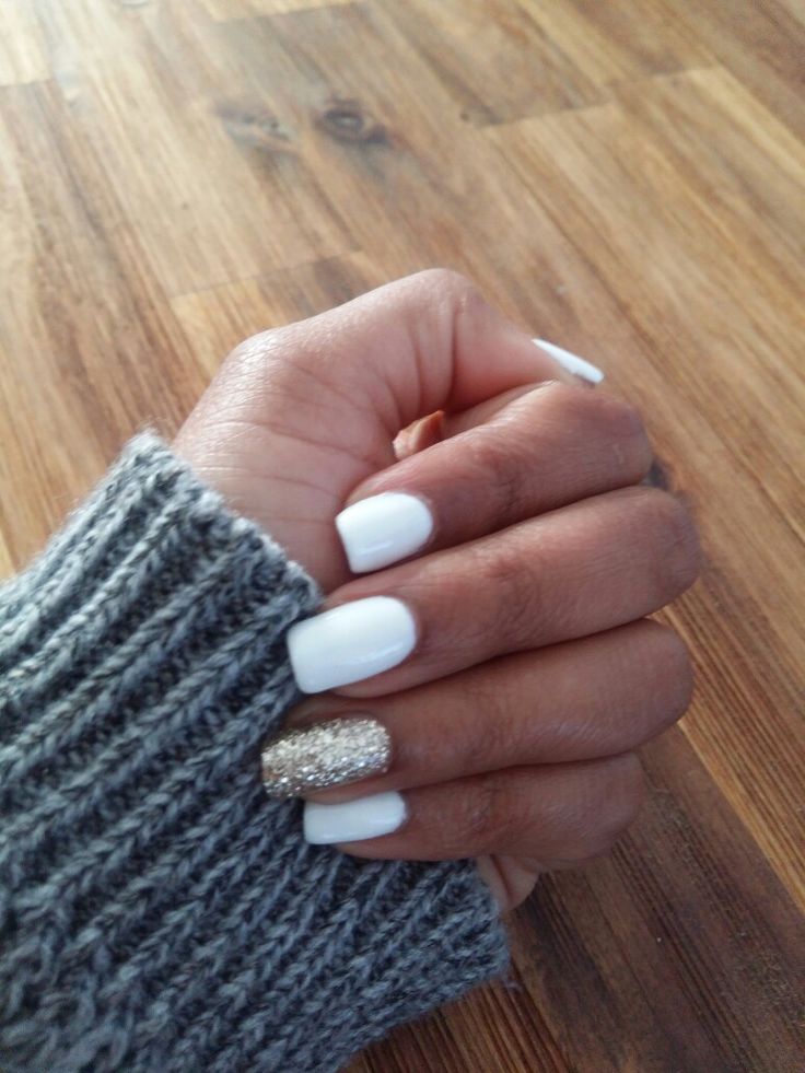 Chic White and Gold Glitter Nail Design: Simple Elegance Meets Glamour.