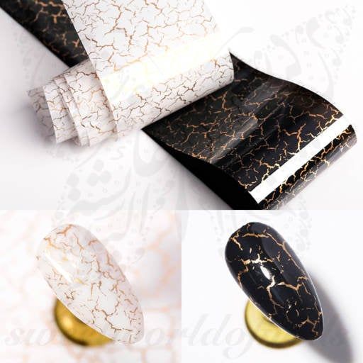 Elegant Cracked Pattern Nail Design with Gold Veins on Black and White Base.