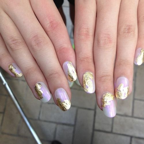 Lavender Nail Design with Artistic Gold Leaf Accents: A Perfect Blend of Subtlety and Glamour.