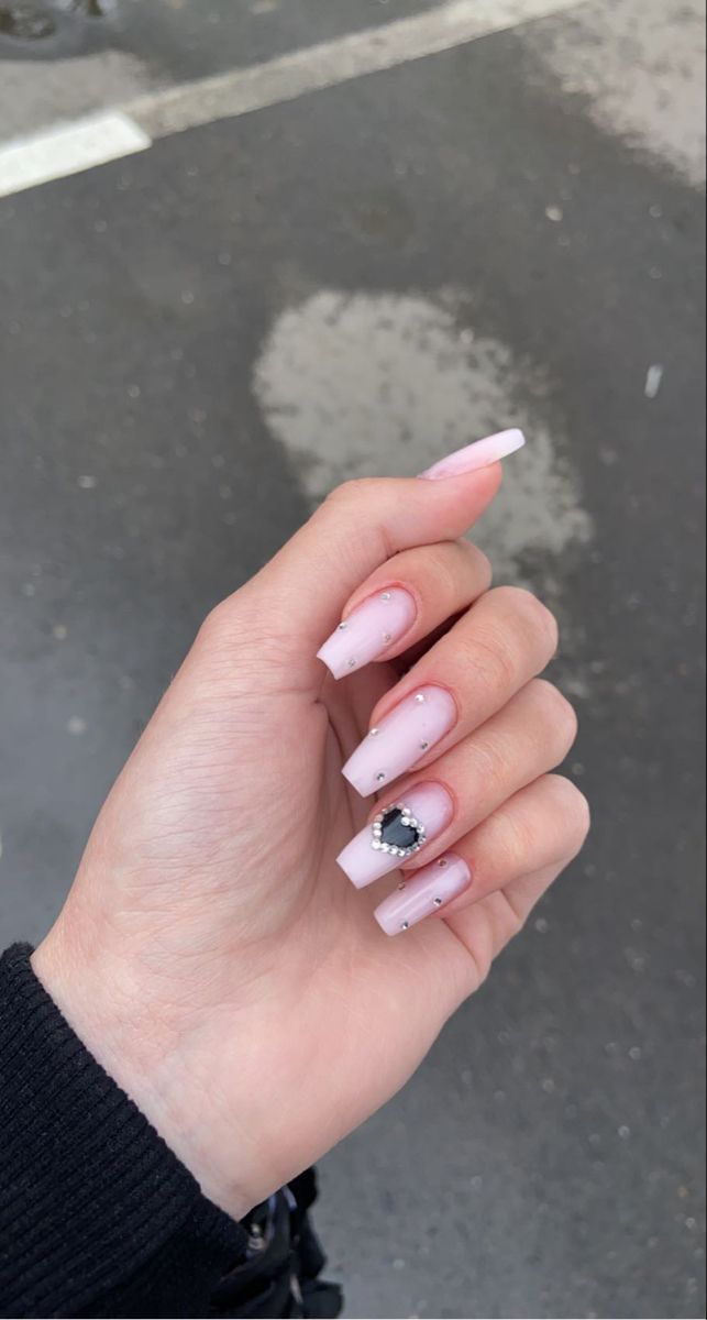 Chic Elegant Nail Design with Soft Pink Base and Gemstone Accents