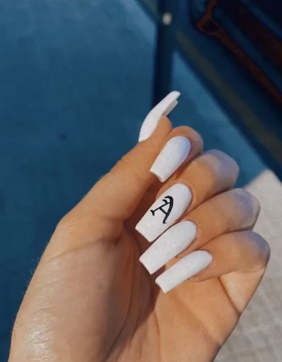 Modern Chic: Elegant Matte White Nails with Bold Minimalist Design